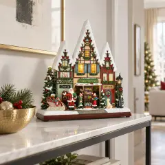 Villaggio Natalizio Animato con Babbo Natale e LED 34,3 cm - scene e villaggi
