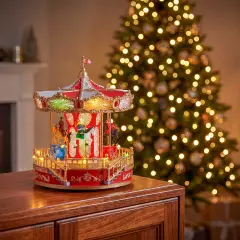 Giostra Natalizia con Soggetti Rotanti LED Colorati e Musica - addobbi casa